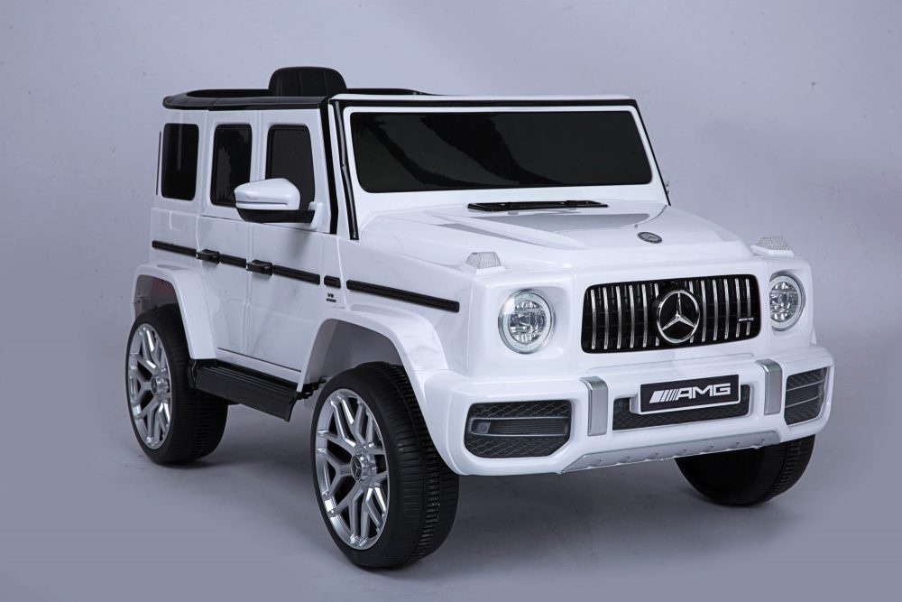 Officially Licensed Mercedes Benz AMG G63 Kids Ride-On Car, Black- white. leather seat- rubber wheels