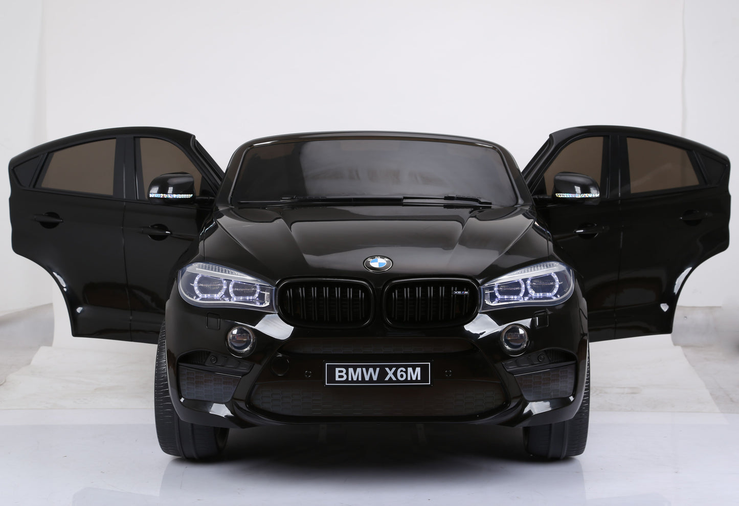 Two-Seater Kids Electric Ride-On Car Licensed BMW X6 M -Black-White